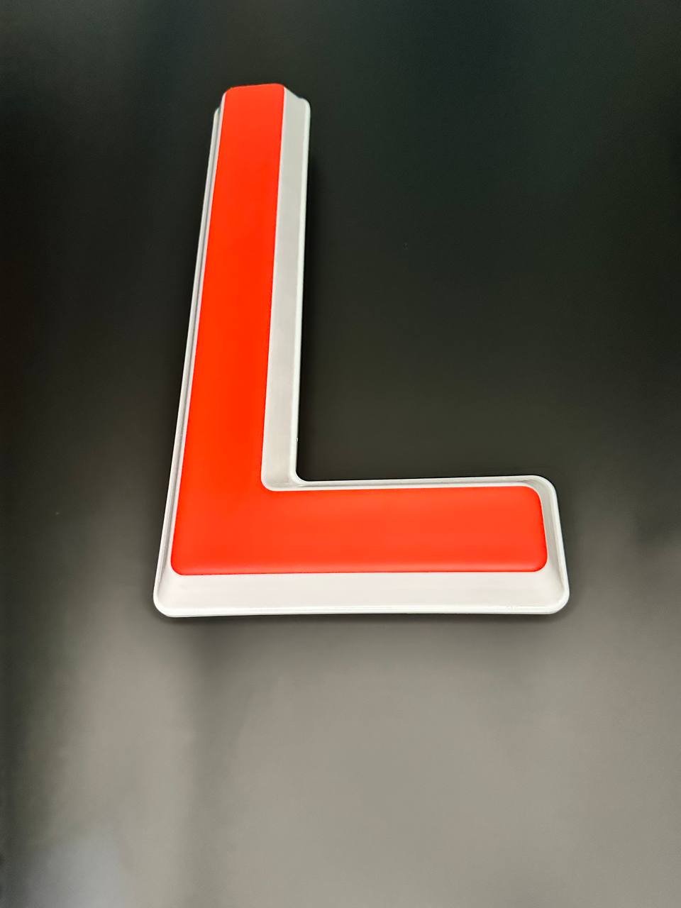 Световая буква L