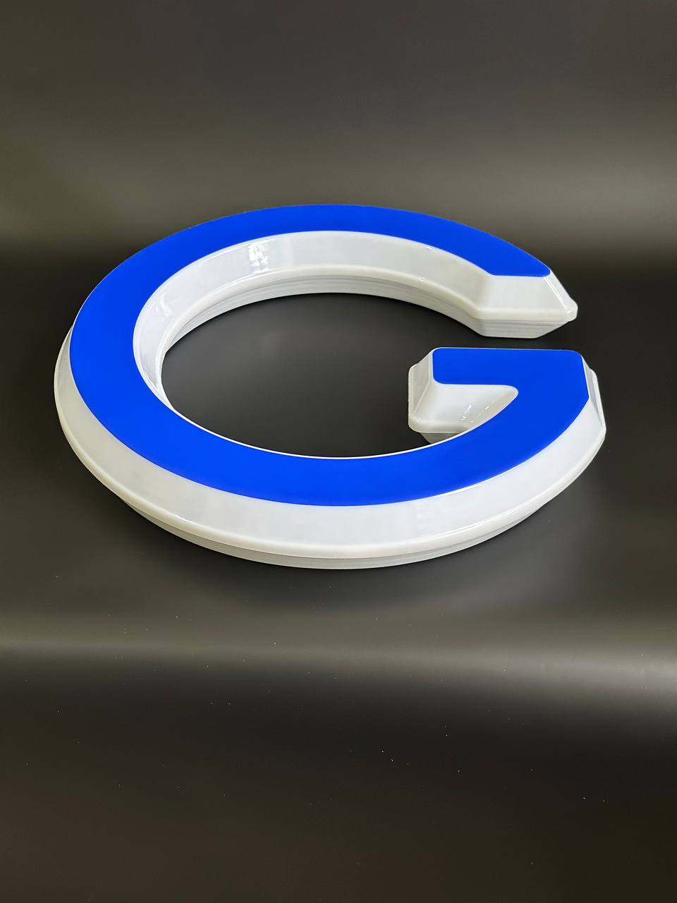 Световая буква G